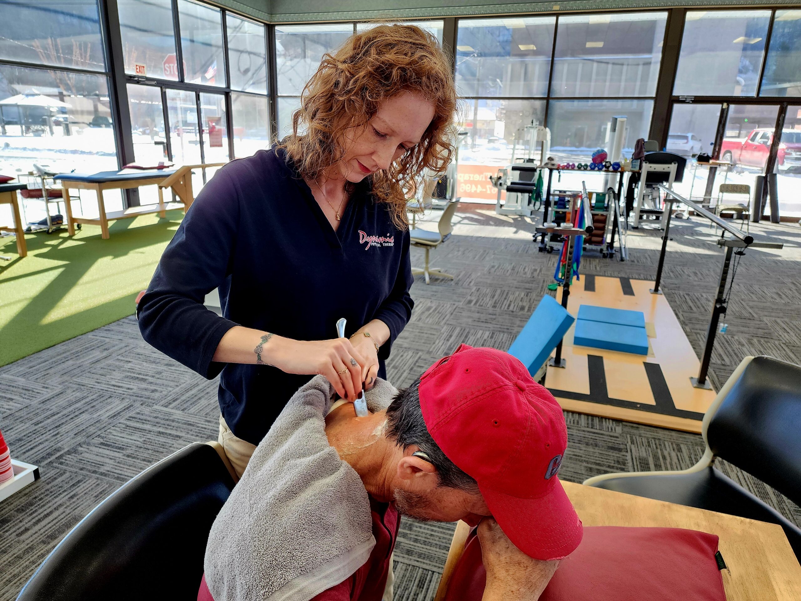 Older man undergoing physical therapy with a personal therapist at Dynamic Physical Therapy & Sports Medicine.