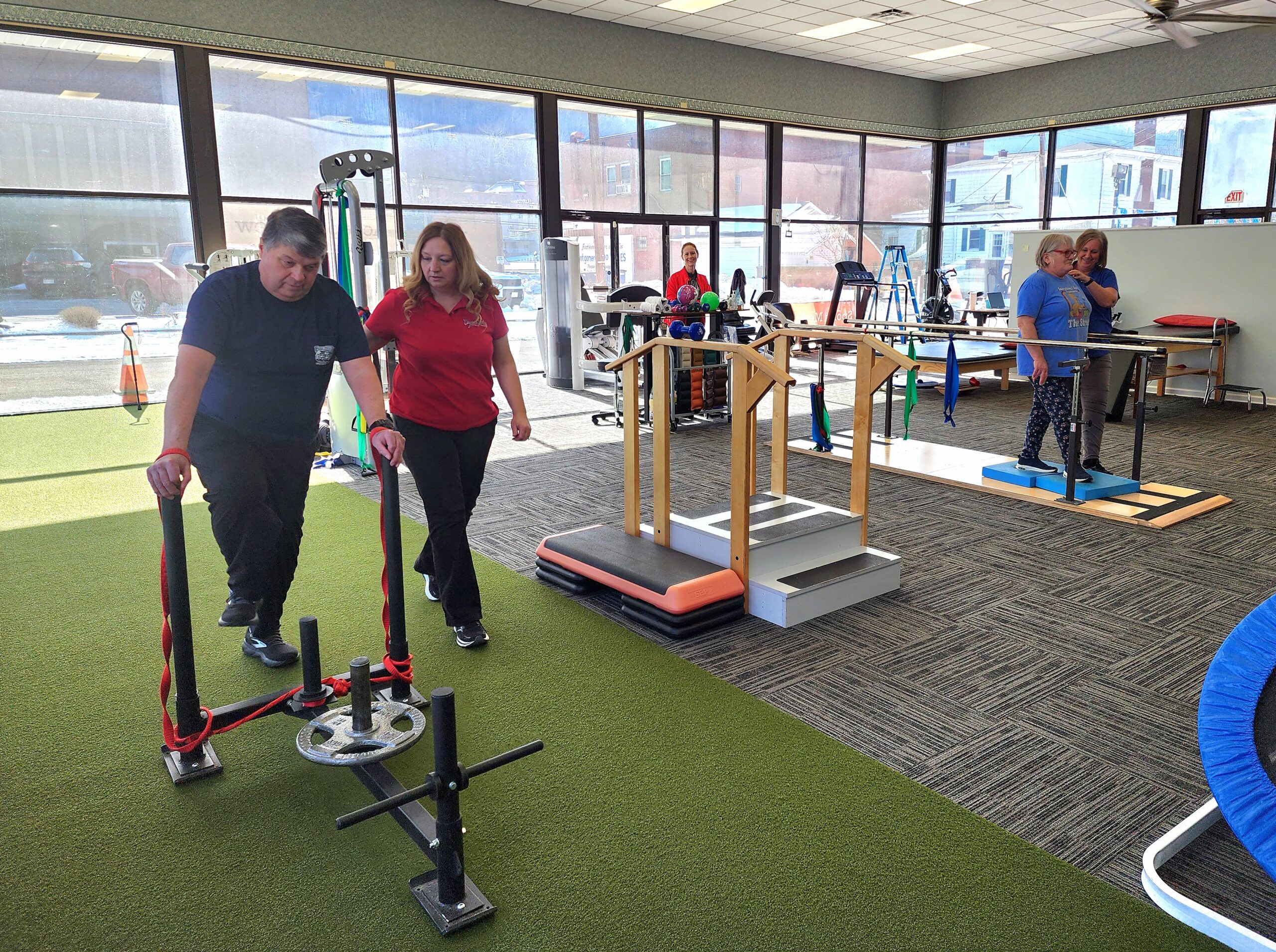 A man going through physical therapy after injury.